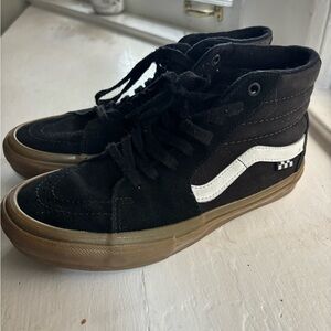 Vans Black and White High-Top Sneakers